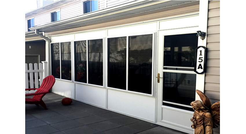 White Enclosure with Storm Doors and Windows